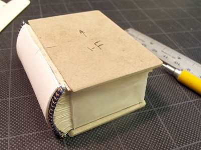 Miniature book with boards book book design bookbinding cream hand bound ivory mini book miniature miniature book