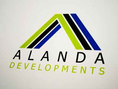 Alanda Developments black blue branding corporate green logo