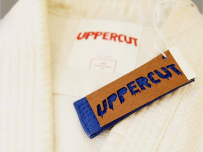 Uppercut branding clothing design graphic design mma tag typography
