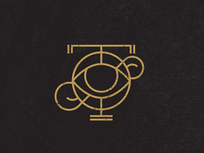 T & F black eye gold icon logo monogram rawk type