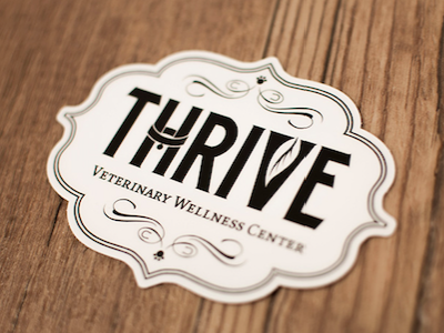 Thrive Veterinary Wellness Center logo holistic logo veterinary