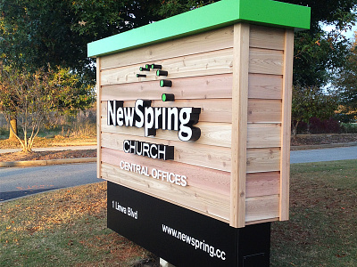 NewSpring Cedar Sign akzidenz brand cedar church environment newspring signage wood