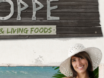 Oppe & Living Foods girl in a big hat header organic raw signs tropical wood