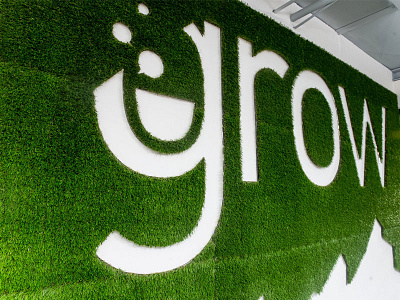 gSchool "Grow" Wall acrylic artificial turf grass grow installation large sans serif sculpture type typography wall