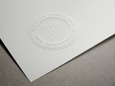 William Carey University academic brand brand identity branding embossed identity logo logo design seal university