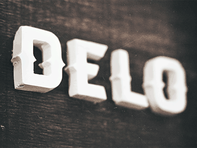 Delo gif logo wooden type