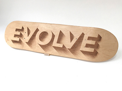 Evolve - Laser Engraved Typographic Skateboard 3d deck design evolve exhibition inspiration lasercut lettering skateboard type typography wood