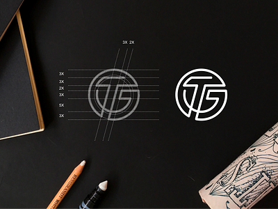 TG monogram logo