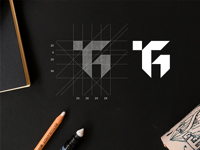 TG monogram logo