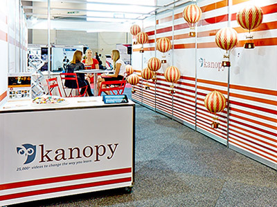 Kanopy Conference Setup balloons conference design library owl poster wall