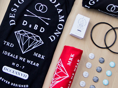 Ideals We Wear arrows brand branding buttons design designbydiamond diamond dsbd hangtags logo shirtdesign teeshirt trademark