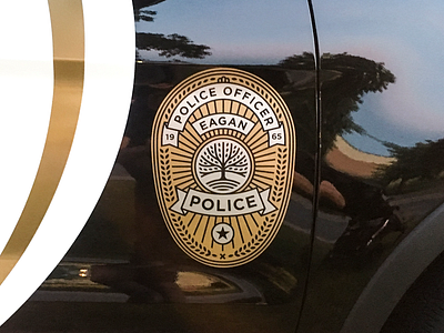 Eagan Police Car badge branding city crest eagan gold logo police silver