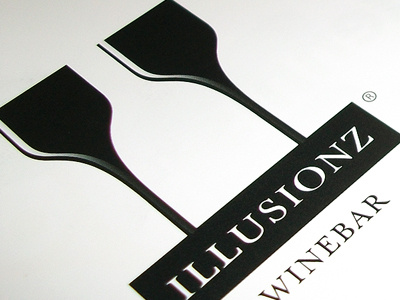 Illusionz Winebar award black gestalt illusion logo negative optical print space vino white wine wolda