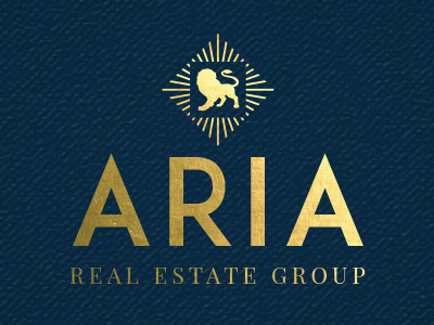 Aria Real Estate Group Logo branding clean foil gold linen lion logo navy sans serif serif texture