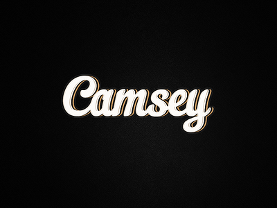 Camsey. camsey gold lettermark logotype white wordmark