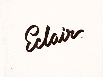 Eclair brush calligraphy chocolate design eclair lettering logo unused