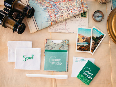 Scout Studio branding business card design embroidery flatlay green logo logotype maps paper photography scout stationary studio system travel typoography velum