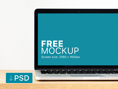 Free mockup: Macbook Pro On A Solid Wooden Table