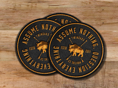 Assume Nothing badge badge hunting bison buffalo label patch sticker typography
