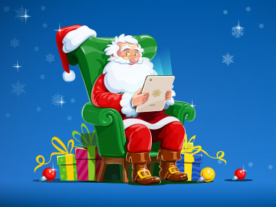 Santa Claus siting in the armchair with tablet.