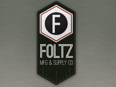 Foltz Manufacturing & Supply Logo fabrication industrial logo manufacturing metal ostrich sans texture