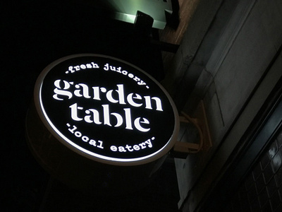Garden Table blade sign identity illuminated signage stencil typography