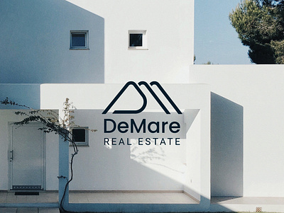 DeMare Real Estate branding logo minimal monogram real estate realtor roof