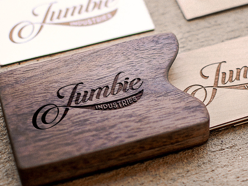 Walnut, laser engraved, card holders. by Jumbie Industries on Dribbble