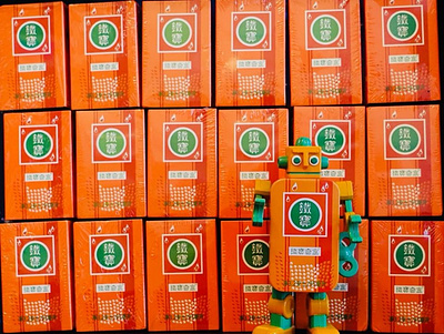 Orange Green TinBot action figures branding culture design designer toys hong kong packaging design retro robot toy vintage
