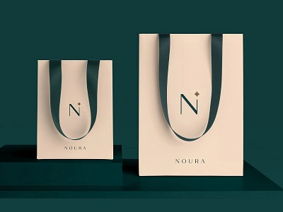 NOURA - Case Study ✨ bag mockup brand identity branding effendy fashion branding feminine hijab logotype luxury luxury branding luxury logo noura packaging design pattern serif sophisticated type typography womenswear wordmark