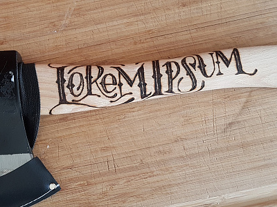 Lorem Axe axe throwing hand lettering wood burning