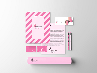 Two-Leaf Clover Stationary Identity Design branding branding design company logo graphic design logo magenta minimalist design pink pink logo simple design stationary stationary design white