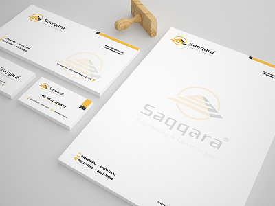 Saqqara construction & engineering branding brand business card construction design envelop grey letterhead logo yellow