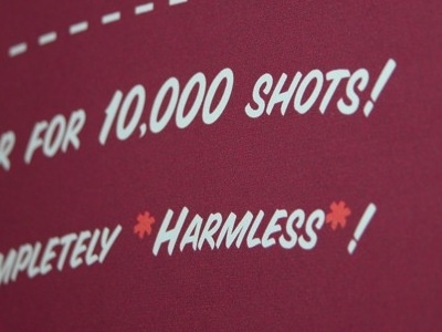 Completely *Harmless*! ad asterisk photo poster print proof typography