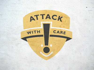 Attack with Care band exclamation face logo symbolism