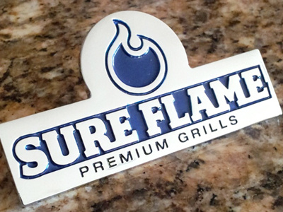 Sure Flame Metallic Grill Logo