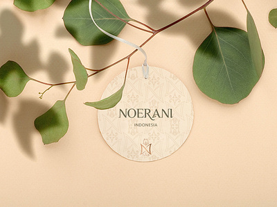 Noerani Hang Tag beauty logo brand design brand identity branding butterfly butterfly logo flower logo hangtag logo minimal packagingdesign