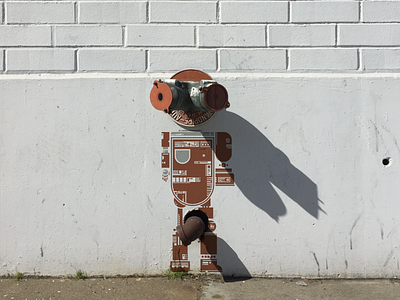 Lil' Pipey circuit curb march of robots metal nipple pipe robot rust street wall
