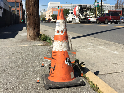 Coney 7th arms cone orange robot san francisco sidewalk street