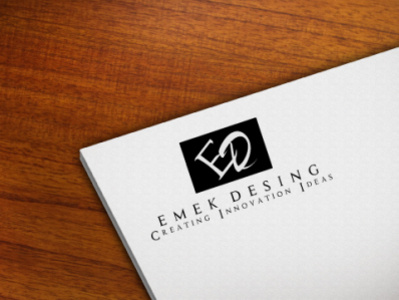 emek Paper Logo Mock up On Wooden Table