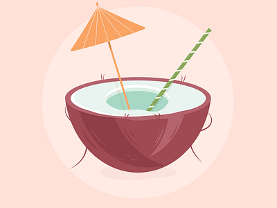 Tropical cocktail in coconut with straw and umbrella