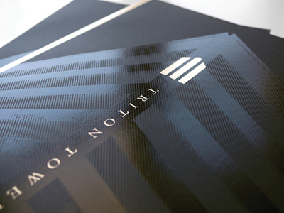 Triton Towers black cover design foil gold graphicdesign layout production realestate varnish