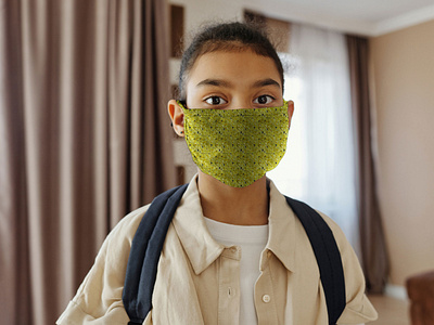 Little Girl Wearing a Face Mask [Free PSD Mockup]