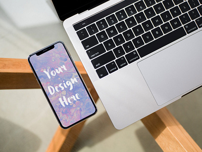 iPhone next to MacBook Pro Mockup