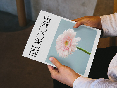 Free Magazine in Hands PSD Mockup