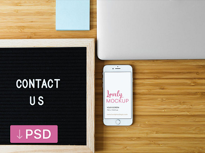 White iPhone MOckup and Contact Us Sign On Desk