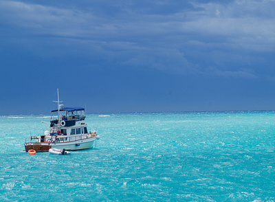 Storm approaching blue boat dry tortugas florida fort jefferson ocean photography storm