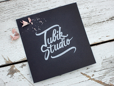 Tubik Studio calligraphy handlettered handstyle lettering logo negative pencil script sketch type typography white