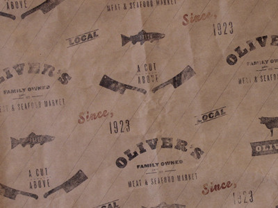 Oliver's Meat Market branding meat. paper wrapping