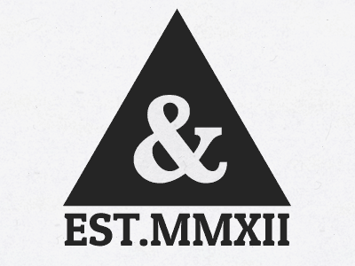 Spark & Current Triangle ampersand angular baskerville black gold logo triangle